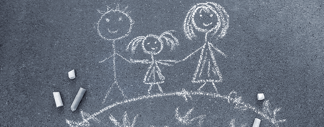 photo of a family drawn in sidewalk chalk on driveway