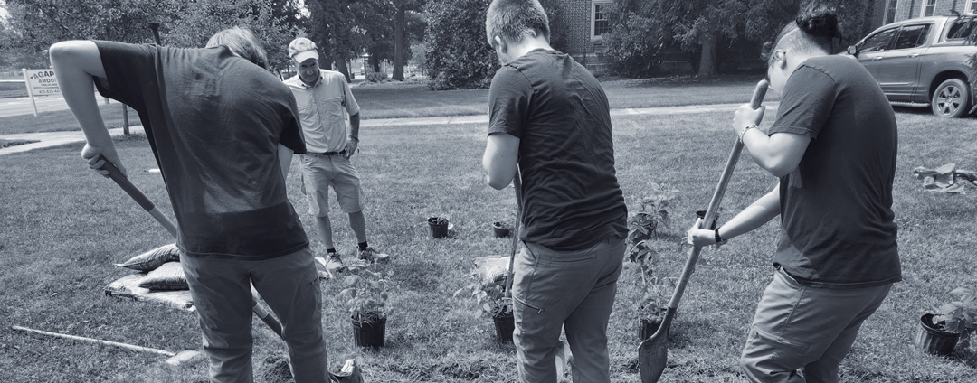 Nexus-Woodbourne youth planting a trees in the community