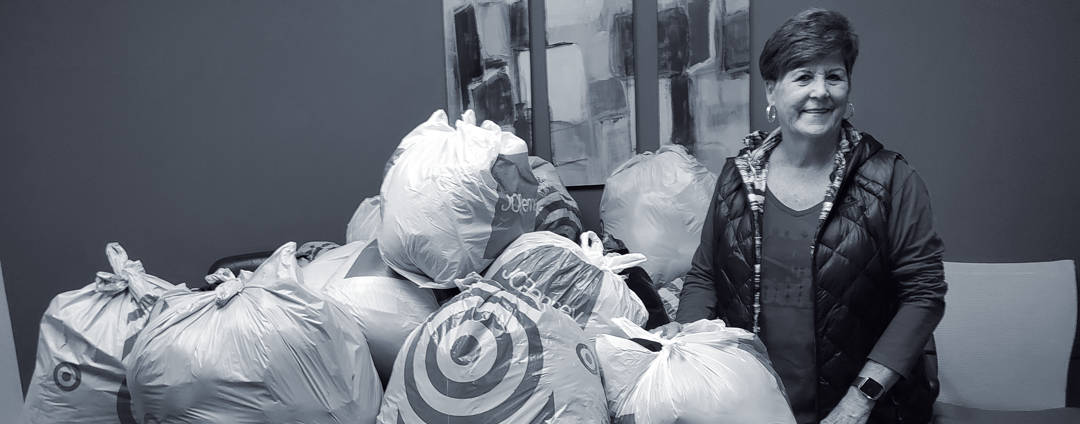 Sharon drops off bags of winter coat donations for Nexus youth