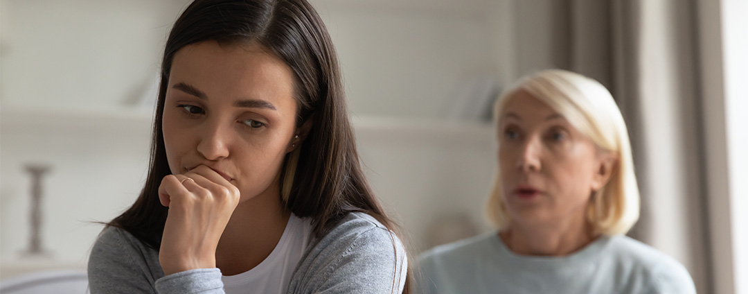 Mother talking to daughter 