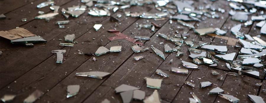 Pictured of glass shattered on the ground.