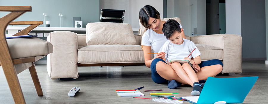 Mother doing homework with son 