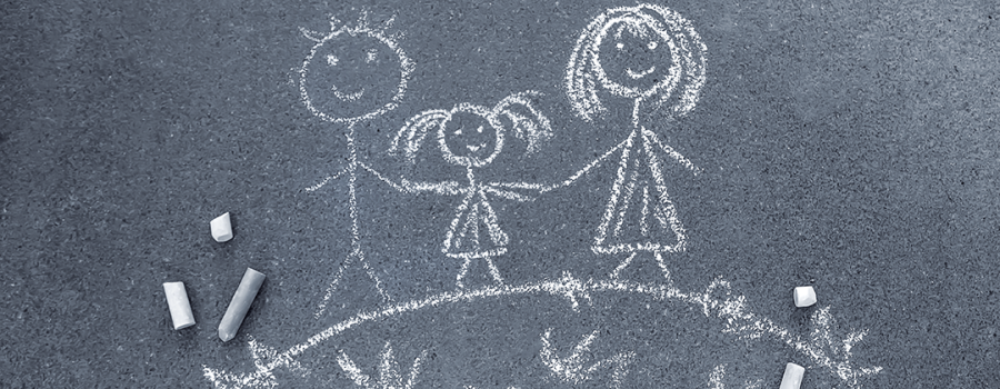 photo of a family drawn in sidewalk chalk on driveway