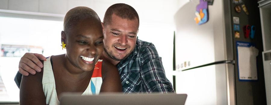 A couple talking to their foster licensing worker via zoom