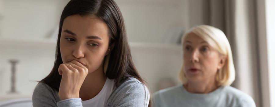 Mother talking to daughter 