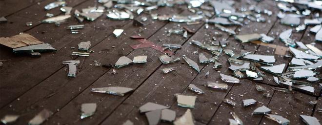 Pictured of glass shattered on the ground.