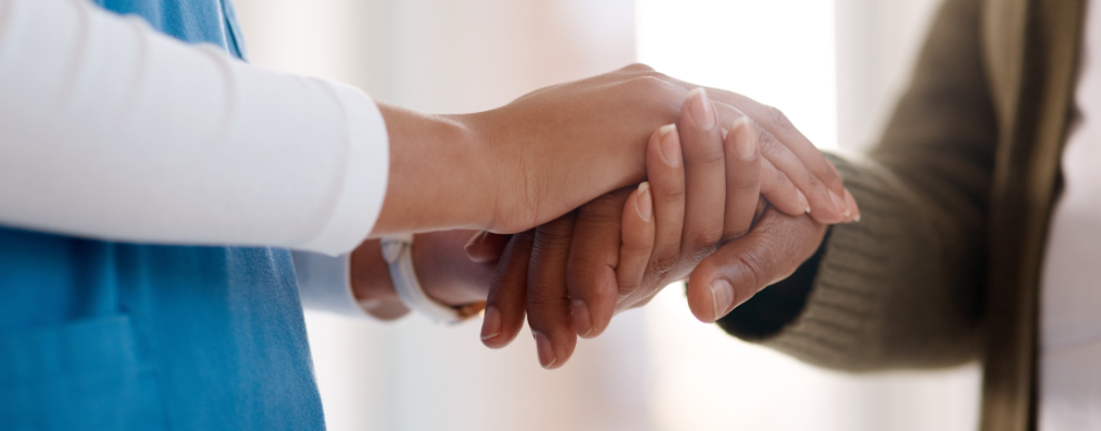 two people holding hands