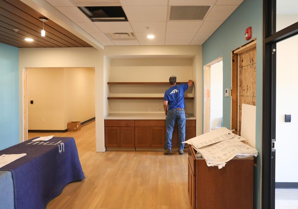 Construction worker finishing inside spaces