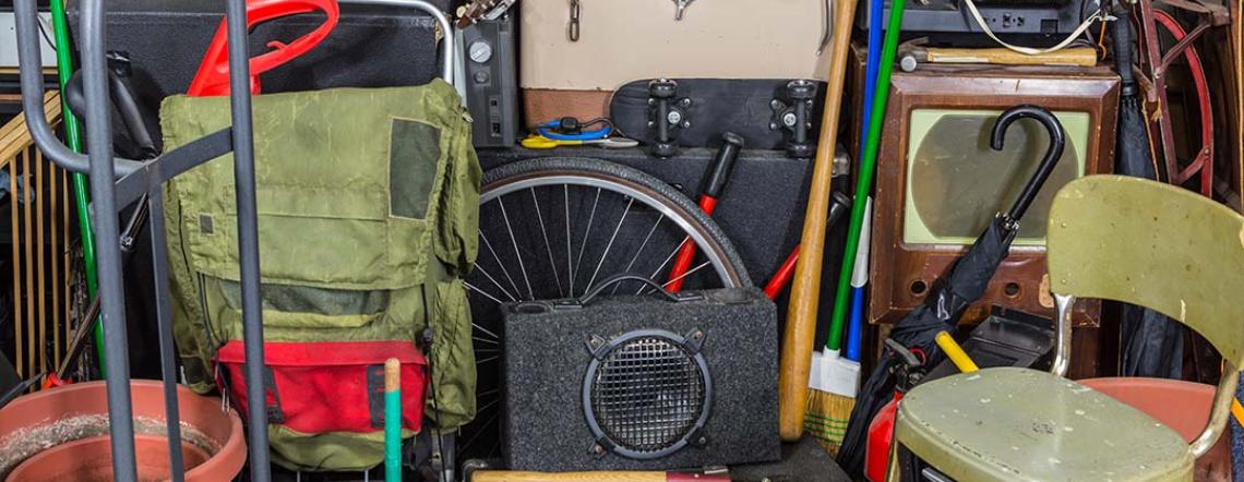 luggage and various items found and stored inside a garage