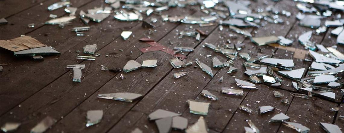 Pictured of glass shattered on the ground.