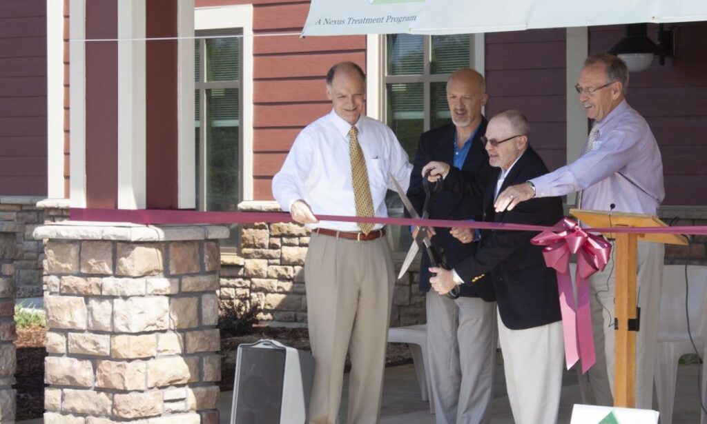 Our staff at the ribbon cutting for their new location.