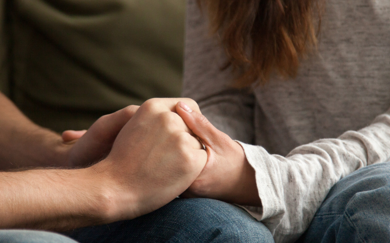 couple holding hands