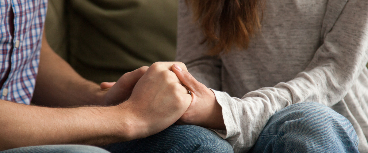 couple holding hands